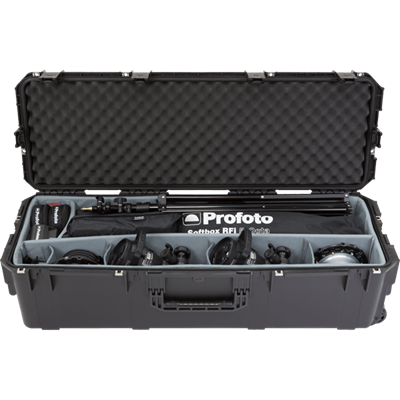 Open, long SKB case with dividers and gear